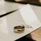 Adding spouse to mortgage - wedding rings on signed document