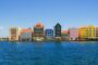 Colourful buildings along the Bermuda waterfront under a clear blue sky