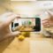 Estate agent expat remote buying - virtual house tour video call on phone