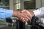 Expat mortgage broker vs bank - advisor meeting handshake