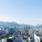 Expat mortgage South Korea - Seoul city skyline with mountains
