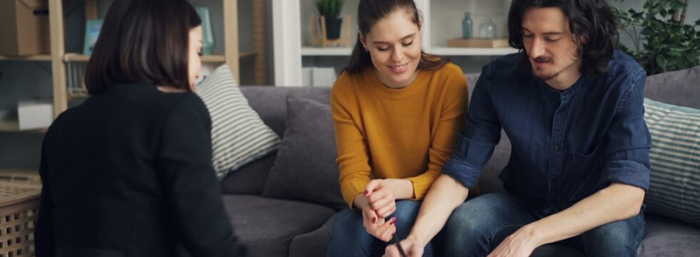 Family reviewing a joint borrower sole proprietor mortgage application together