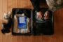 Career break mortgage abroad - traveler packing suitcase for sabbatical