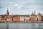 Stockholm waterfront with traditional Swedish buildings reflected in the water