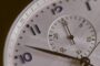 Bridging loan vs mortgage UK - stopwatch representing speed and timing