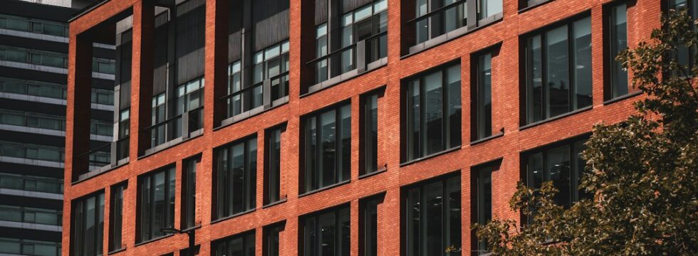 Commercial investment mortgage UK - office building double decker bus