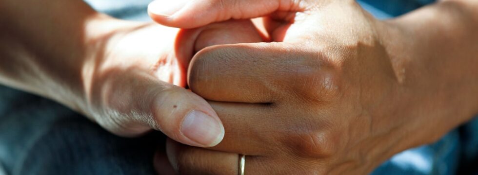 Critical illness cover UK - hands supporting recovery