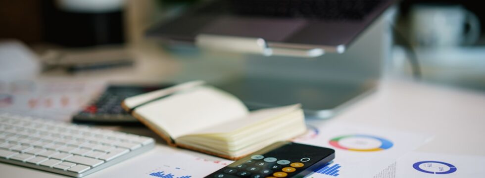 Debt consolidation UK - budget planning calculator and paperwork