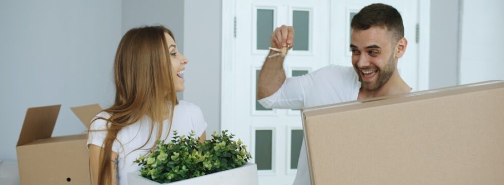 First Time Buyer Mortgage UK First time buyer mortgage UK - new homeowners receiving house keys
