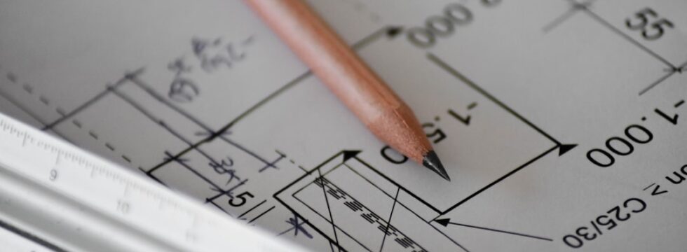 First time developer finance UK - construction blueprint plans