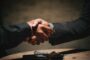 75% LTV commercial mortgage UK - business handshake deal