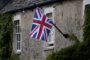 Forces Help to Buy UK - Union Jack flag on stone cottage