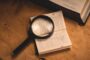 Bridging loans credit history declined - document review magnifying glass