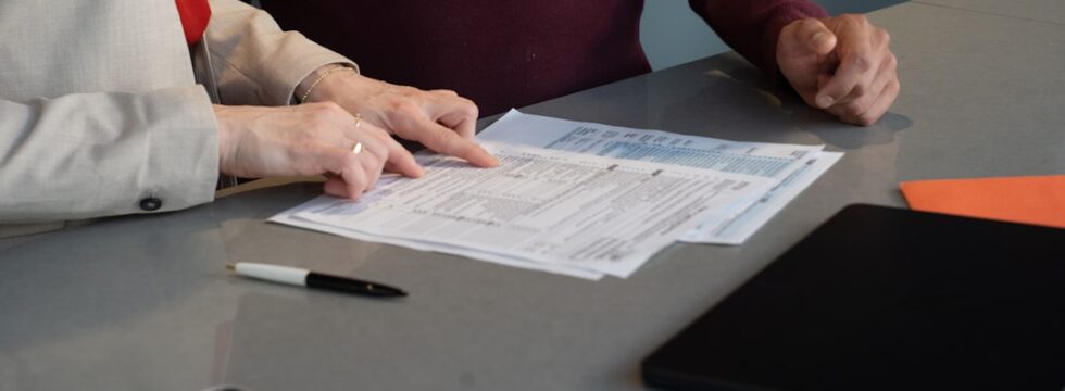 Commercial Mortgage Decision in Principle Commercial mortgage decision in principle UK - business meeting document signing