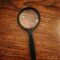 Commercial mortgage redemption overpayment small print UK - magnifying glass document