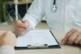 Critical illness cover conditions list UK - clipboard medical consultation