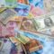 Currency risk expat mortgage UK - international banknotes