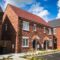 Developer refinancing decision UK - completed new build housing estate