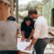 GDV calculation development finance UK - surveyor blueprint construction site