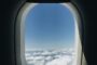 UK life insurance moving abroad expat - airplane window view