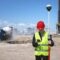 Monitoring surveyor development finance UK - surveyor inspecting construction site