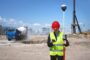 Monitoring surveyor development finance UK - surveyor inspecting construction site