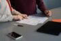 Mortgage underwriting explained UK - professionals reviewing documents