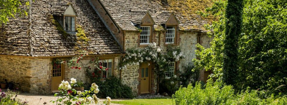 Non-standard construction home insurance UK - thatched cottage countryside