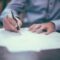 Recourse vs non-recourse lending UK - contract signing pen