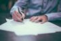 Recourse vs non-recourse lending UK - contract signing pen