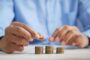 Rolled up interest development finance UK - compound interest growing coins
